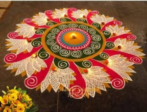 கோலத்தின் நடுவே விளக்கேற்றி, சாணத்தில் பூசணிப்பூ வைப்பர்